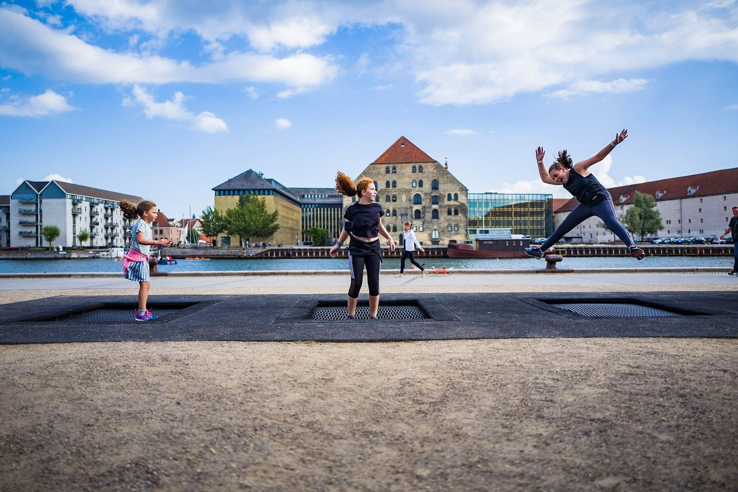 Trampolining in Copenhagen - the most child-friendly city in Europe (they are built in to the pavements)