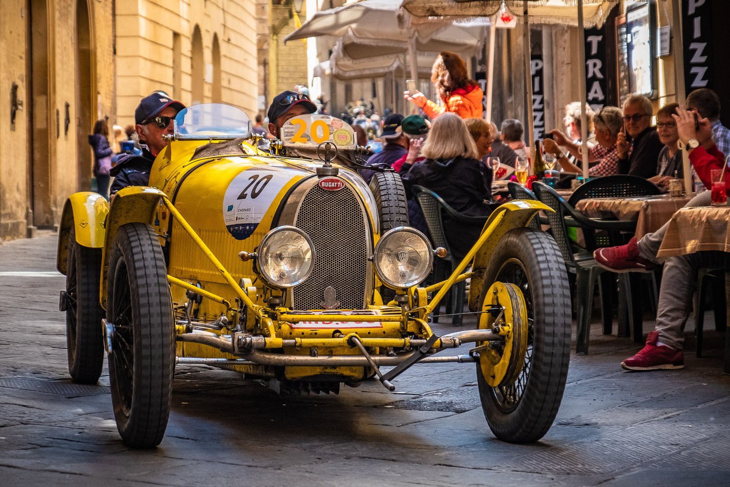  Even though there was a car race going on - Italians have their priorities - nothing gets in the way of their mid-morning drink. 