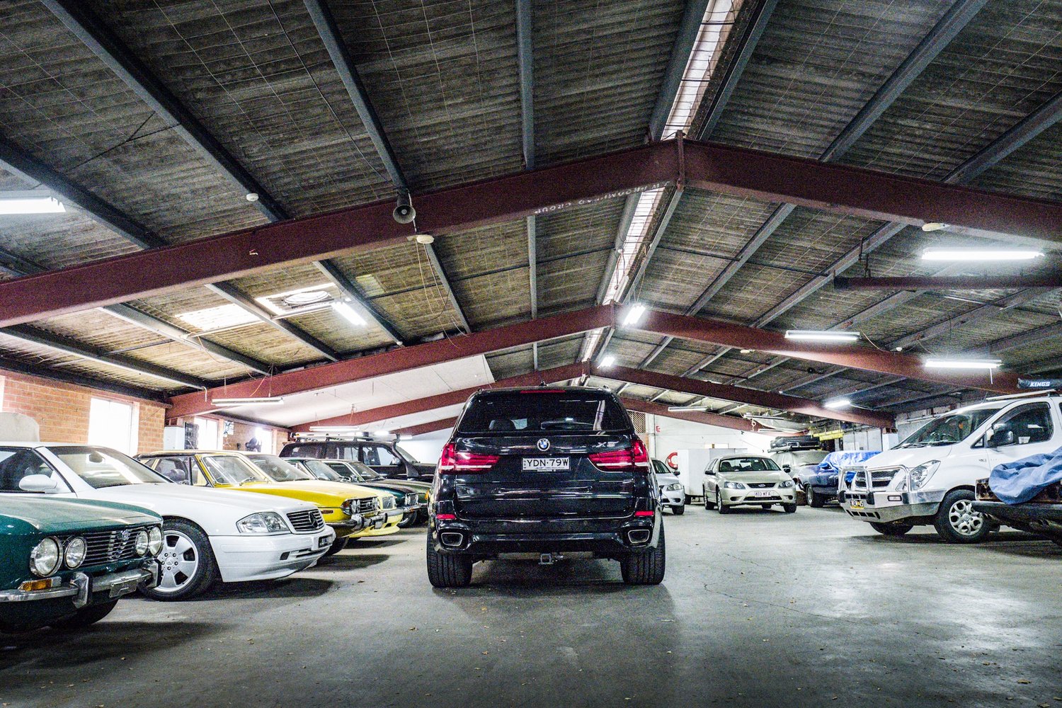 The car went to storage, ironically surrounded by old Italian classics.